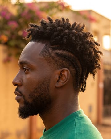 Tissage homme boucles dessus